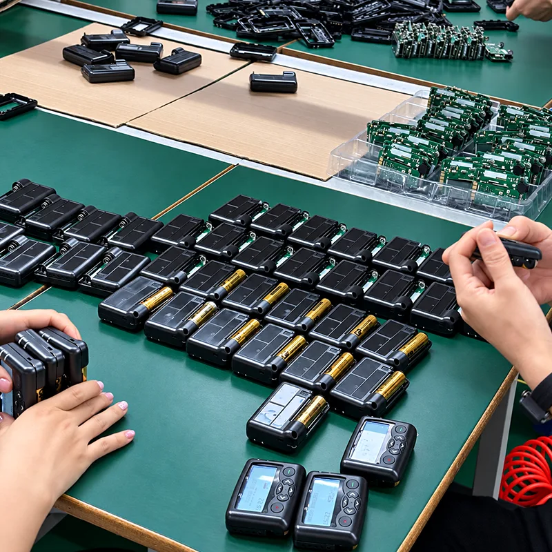 Pager assembly and batch production at WEX manufacturing facility